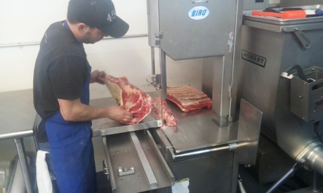 Kent working the band saw. 