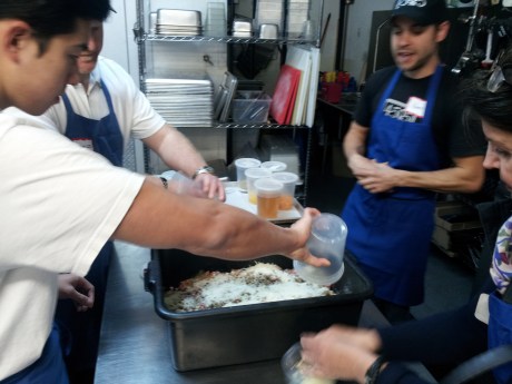 Adding all the ingredients to the ground chicken.